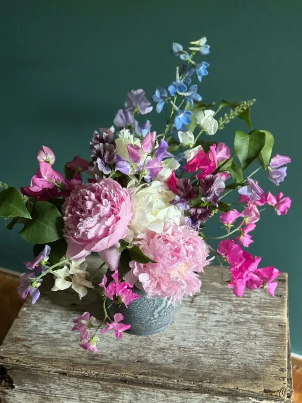 Colorful flowers on wooden table