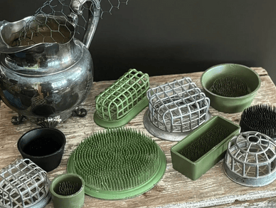 Metal and ceramic flower holders collection